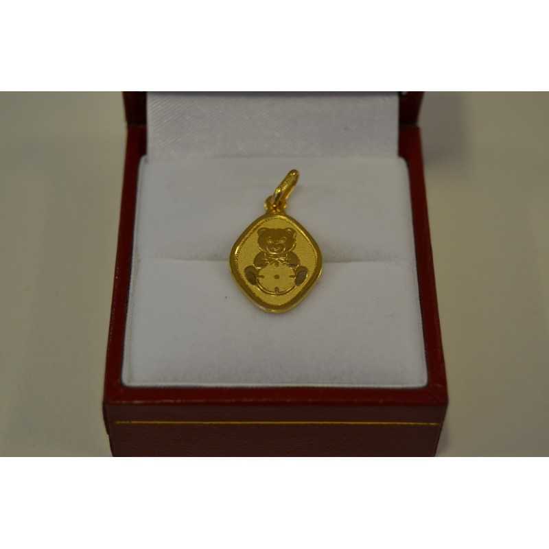 Colgante tipo placa de osito en oro 18k