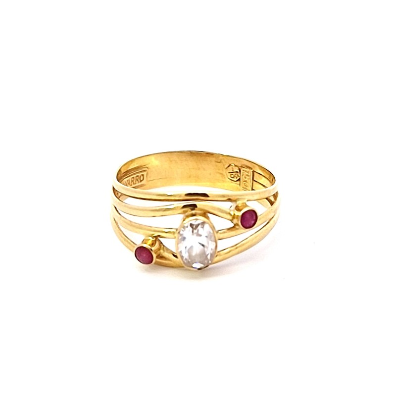 Anillo en oro de 18k con piedras blancas y rojas